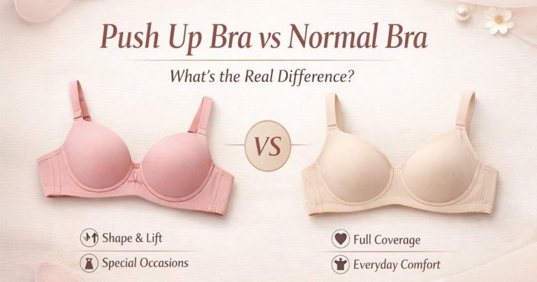 A beige t-shirt bra and black full coverage bra arranged neatly on wood.